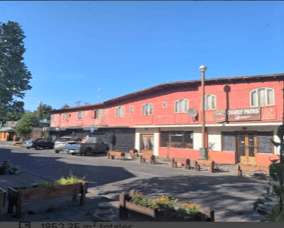 Vende Sitio Construído con Locales Comerciales en pleno Centro de Pucon — fotografía 1